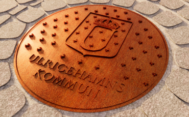 Brunnslock med Ulricehamns kommuns logga